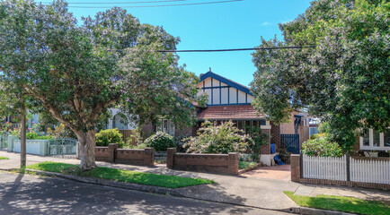 Naklejka premium Old Federation Double Brick house in an inner western Sydney Suburb at beautiful colourful sunset NSW Australia