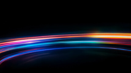 Vibrant rainbow light streaks on black background for dynamic design concepts