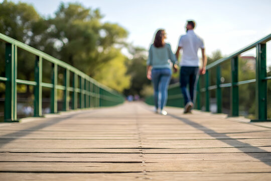 Firting Couple Walking Hand-in-Hand on a Wooden Boardwalk