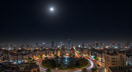 Fototapeta premium Cityscape Nocturne Under a Stellar Sky