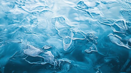 A serene blue water surface with intricate ripples and bubbles, capturing the essence of calmness and fluidity.