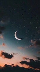 Naklejka premium The crescent moon and twinkling stars adorn the night sky