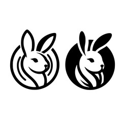 Vector image of two rabbits, one black, one white, with rabbit faces in circular shapes, a profile of the rabbit's face and its outlines.