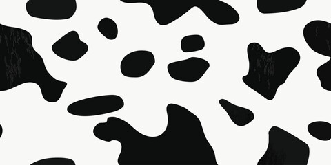 Classic cow print seamless pattern. Black and white animal print repeat background for fashion, textile, packaging, and more