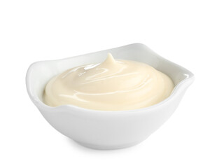 Tasty mayonnaise sauce in bowl isolated on white