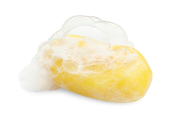 Yellow soap with foam on white background