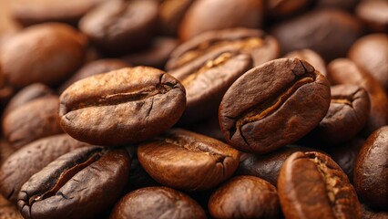 Fototapeta premium Roasted Coffee Beans Close-up: A macro shot showcases a pile of freshly roasted coffee beans, their rich brown color and intricate textures illuminated.