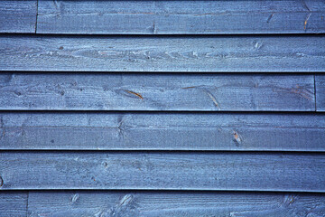 Fototapeta premium Deep blue rows in straight lines of rough sawn lumber textures
