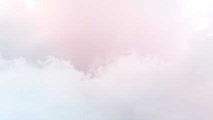Obraz premium Breathtaking View of Soft Pink Sky with Fluffy Clouds Creating a Dreamy and Serene Atmosphere Above