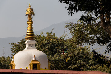 Small stupa with the statue of Buddha at Swayambhunath, Kathmandu, Nepal