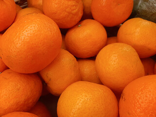 fresh orange fruit as background, top view