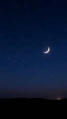  A Peaceful Starry Sky with Twinkling Stars and a Soft Crescent Moon Illuminating the Earth