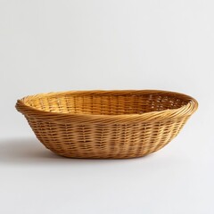 Obraz premium Empty Oval Wicker Basket on White Background