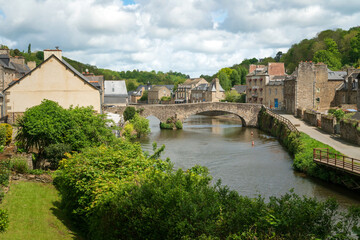 Naklejka premium View of the city and the embankment of the Ile Rance canal on a sunny summer dayDinan, Cotes-d'Armor, Brittany, France