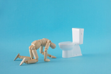 トイレの前で倒れる人