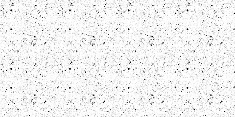 Fototapeta premium Abstract black ink splatters on white background pattern