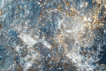 Obraz premium Close-up of bubbly, swirling water surface. Ideal for backgrounds, illustrating purity, or natural textures.