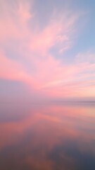 Obraz premium The Soft Gradient of the Sky Reflects in the Tranquil Waters Below, Creating a Dreamy Scene