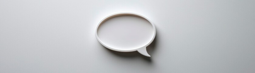 Minimalist White Speech Bubble on Plain Background Symbolizing Communication and Dialogue Concepts