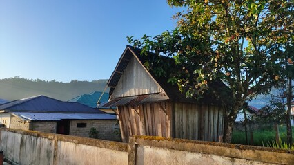 A traditional building for storing harvested rice. The entire building is made of wood, the building enlarges upwards.