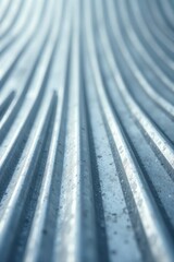 Abstract Close-Up of a Corrugated Metal Surface with Subtle Curves and Depth