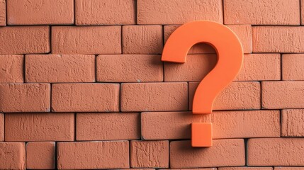 Bright orange question mark symbol on textured brown brick wall with shadows and highlights for creative concepts