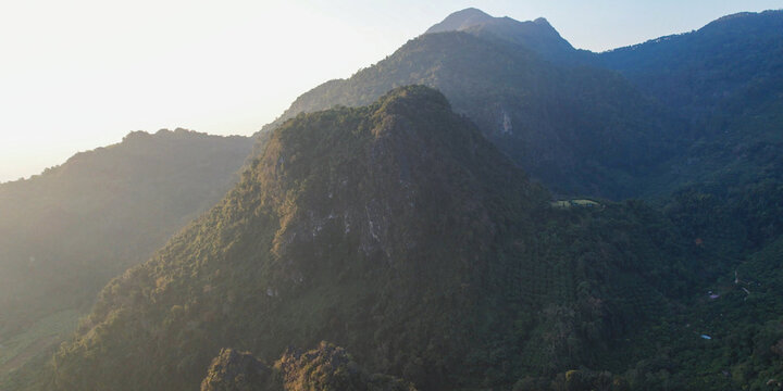 Aerial view from drone of the rural village in the mountains before sunrise