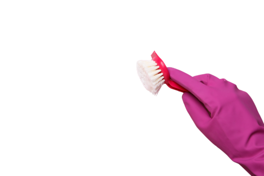 Spring cleaning, hand in a pink rubber glove with a cleaning brush, isolated on white background, PNG