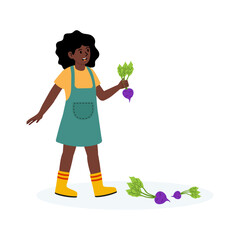 Child harvesting radishes in a garden during a sunny day