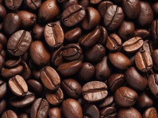 Fototapeta premium Top view of roasted arabica coffee beans texture background