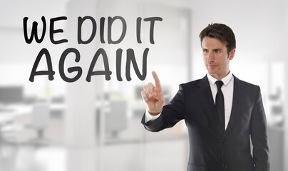 Businessman touching We did it again