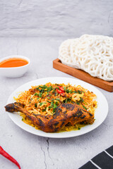 curry laksa with rice noodles and chicken. Laksa is a type of noodle dish with spices typical of Peranakan culture that combines Chinese and Malay. Asian traditional soup.