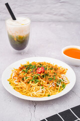 curry laksa with rice noodles. Laksa is a type of noodle dish with spices typical of Peranakan culture that combines Chinese and Malay. Asian traditional soup.	
