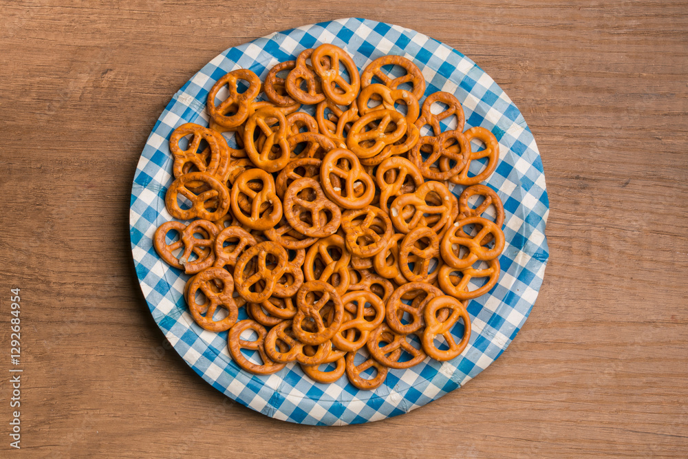 Wall mural German pretzels on a traditional blue checkered plate