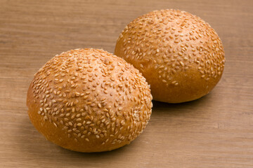 brown buns with white sesame seeds