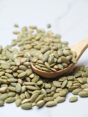   Pile of healthy pumpklin seeds.