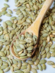 Flat lay of pumpkin seeds on a table.