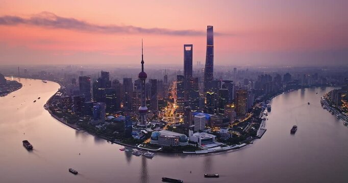 Aerial view of shanghai skyline at dusk with dramatic sky