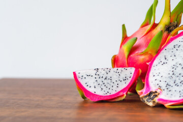 Dragon fruit on wooden table background