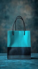 Teal shopping bag on a table against a dramatic backdrop