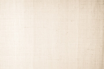 Fototapeta premium Brown sackcloth woven texture background in natural pattern. Jute hessian burlap, linen background in light beige cream color blank. Weaving canvas fiber line cotton cloth textured as organic.