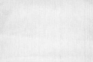 White color fabric canvas woven texture background in pattern light blank. Natural gauze linen, carpet wool and cotton cloth textile textured as clean empty for decoration text. Grey sack material.