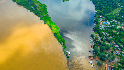Aerial View of the Amazon River and Lush Rainforest in the Amazonas Region	