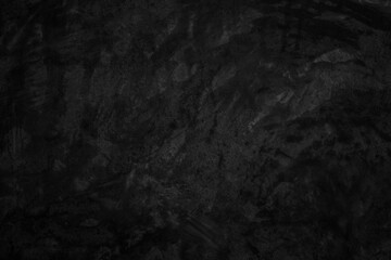 Black dark concrete wall background. Pattern board cement texture grunge dirty scratched for show anthracite promote product urban floor and abstract paper design element decor. Blackboard blank.