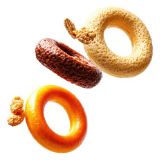 Assorted variety of delicious donuts topped with colorful glazes and sprinkles on a decorative plate isolated on transparent background..