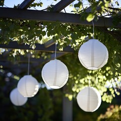 Obraz premium Outdoor Solar Lanterns Hanging Under Pergola
