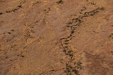 Aerial views of the landscape surrounding Kings Canyon, Watarrka National Park - Northern Territory.	