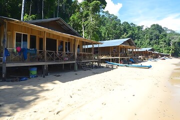 Beachfront stilt houses, tropical jungle