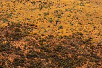 Aerial views of the landscape surrounding Kings Canyon, Watarrka National Park - Northern Territory.	