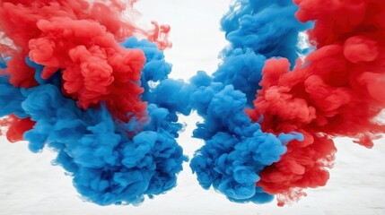Obraz premium A vibrant explosion of red and blue smoke creates an artistic and dynamic visual against a light background.